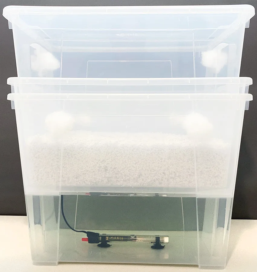 The CyLab as supplied: two clear nesting tubs with filter plugs and a heater unit