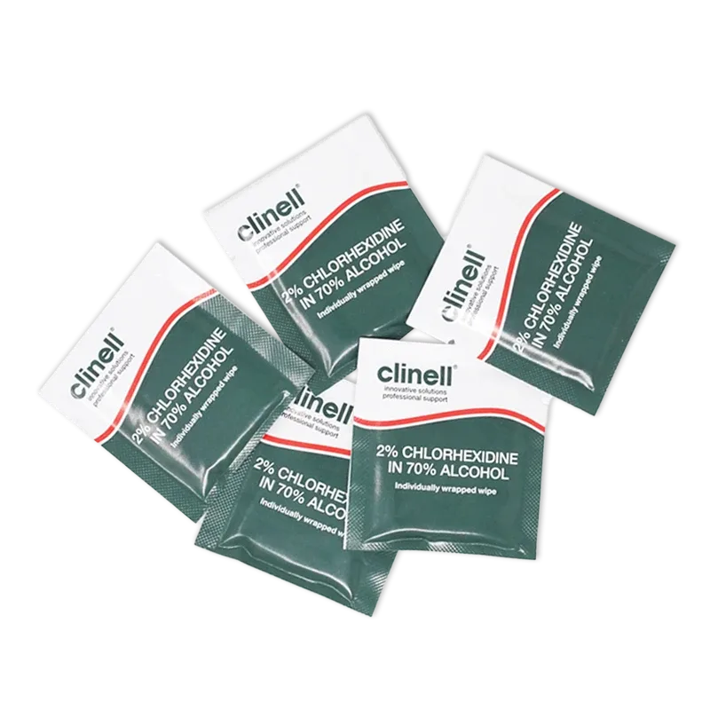 Six sealed Clinell chlorhexidine alcohol wipe sachets arranged on black
