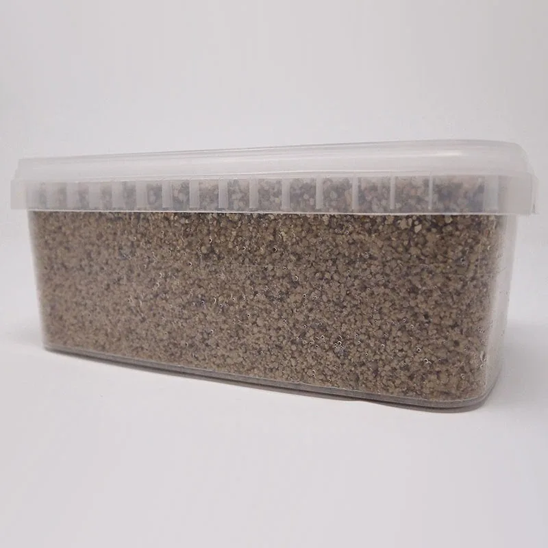 XL PF-Tek Mushroom Grow Kit from the side, showing the depth of packed brown substrate through the clear tub wall